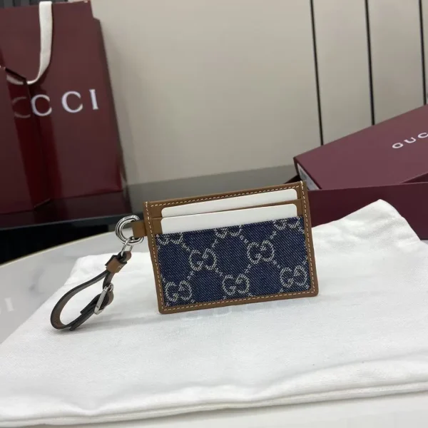Gucci GG Monogram Card Holder with Leather Wrist Strap image 1
