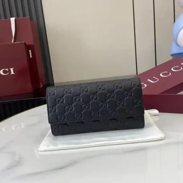 Gucci Black GG Embossed Leather Wallet image 1