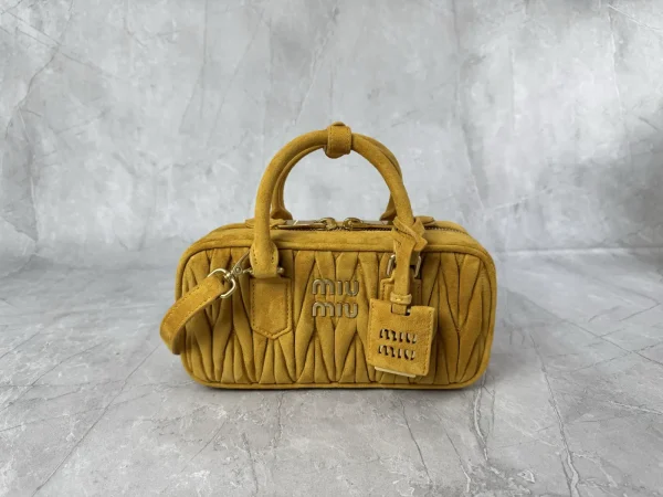 Miu Miu Mustard Yellow Quilted Suede Top Handle Bag image 1