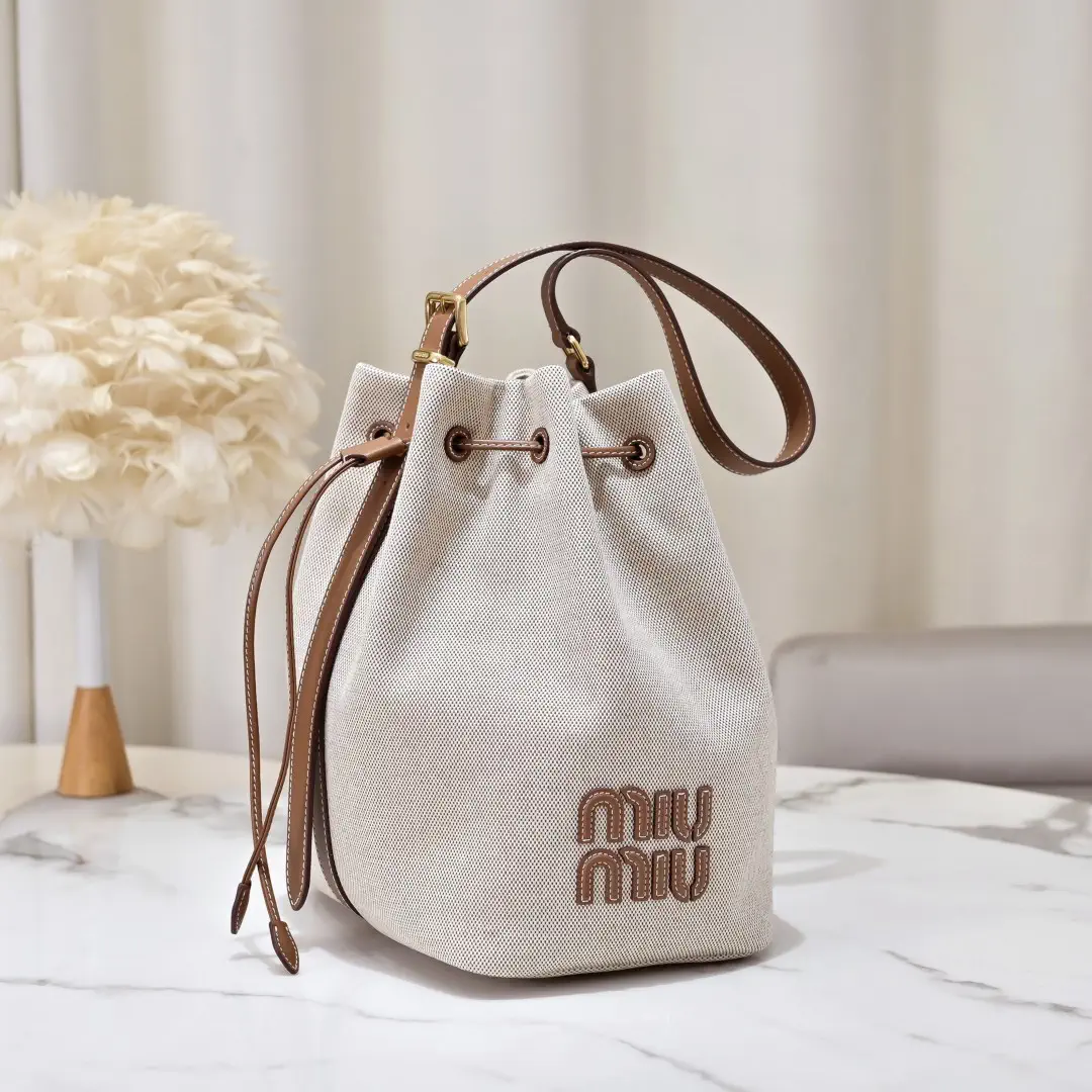 Miu Miu Canvas Bucket Bag image 1