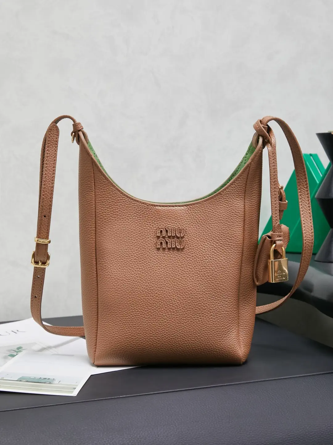 Miu Miu Leather Crossbody Bag with Lock Charm image 1