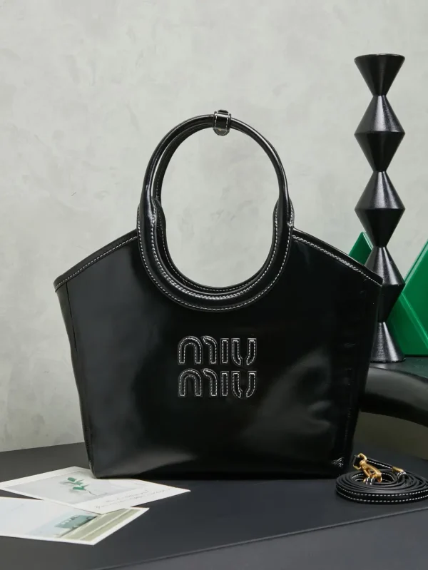 Miu Miu Black Leather Tote Bag with Adjustable Shoulder Strap image 1