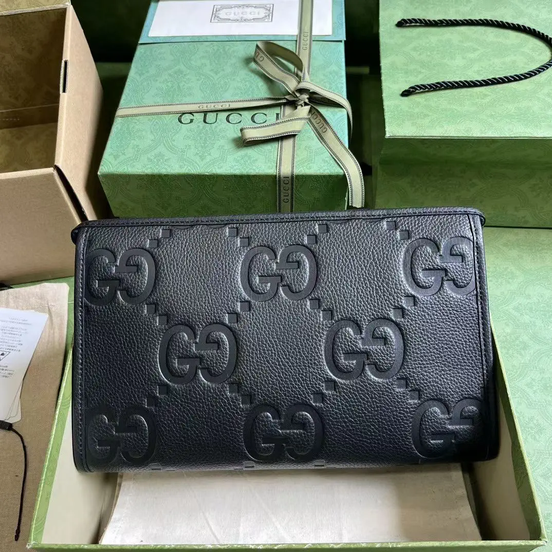 Gucci Black Embossed GG Clutch image 1
