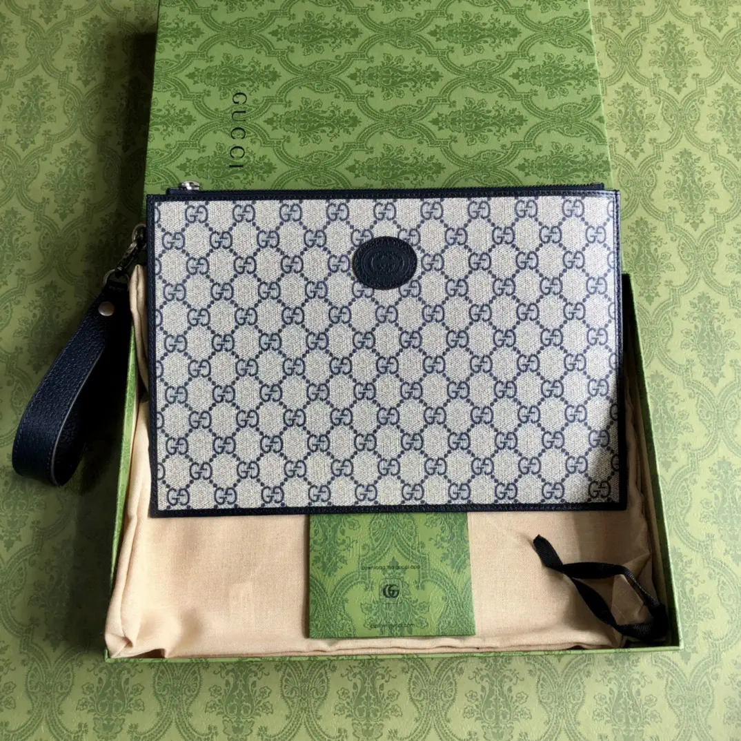 Gucci Monogram Canvas Clutch image 1