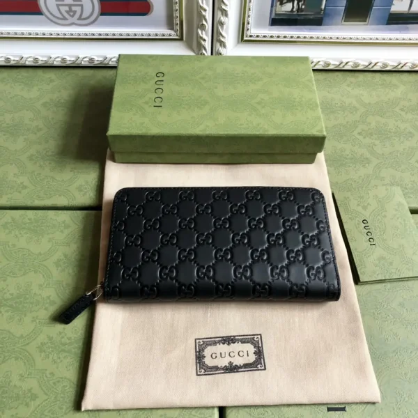 Gucci Black Embossed GG Zip Around Wallet image 1