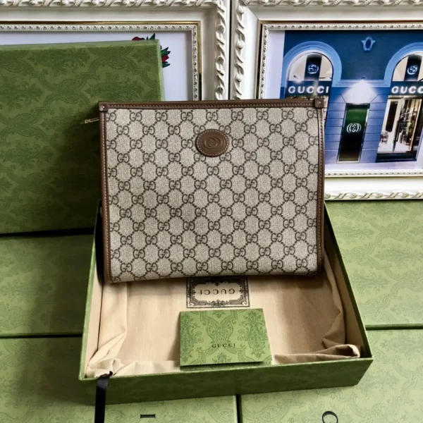 Gucci Monogram Canvas Clutch image 1