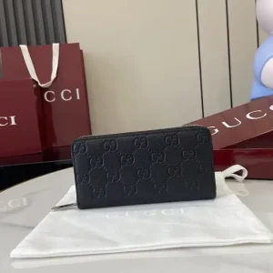 Gucci Black GG Embossed Leather Zip Around Wallet image 1