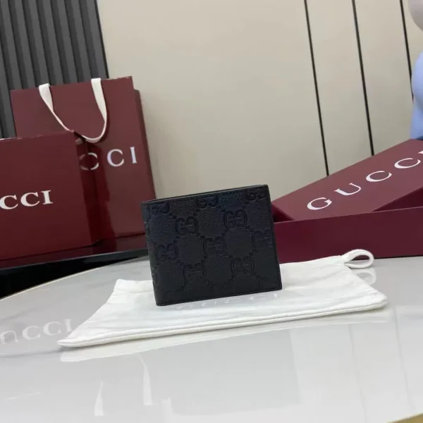 Gucci Black GG Embossed Bifold Wallet image 1