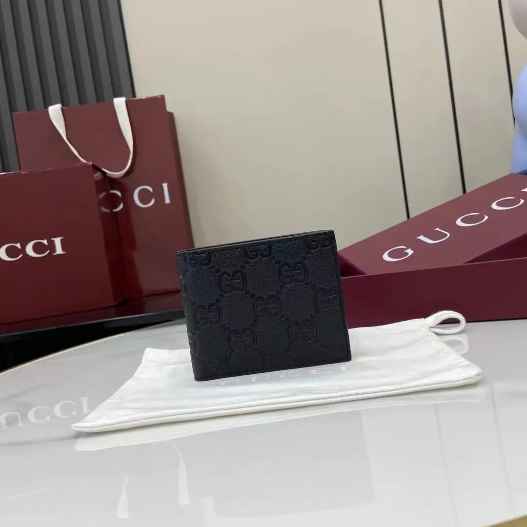 Gucci Black GG Embossed Bifold Wallet image 1