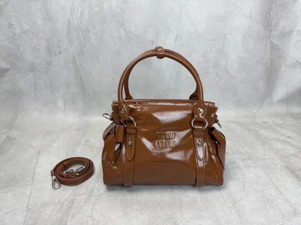 Miu Miu Brown Patent Leather Top Handle Bag with Bow Details image 1
