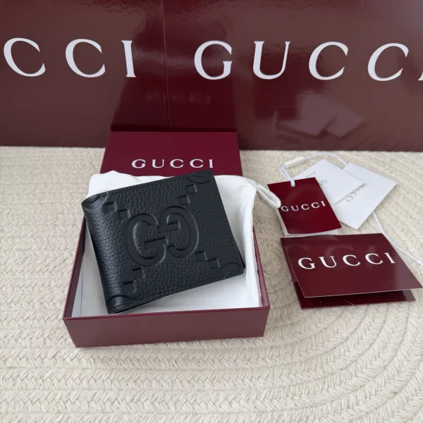 Gucci Black Embossed GG Bifold Wallet image 1