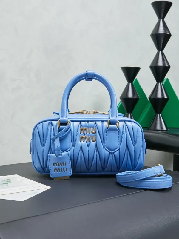 Miu Miu Blue Quilted Top Handle Bag image 1