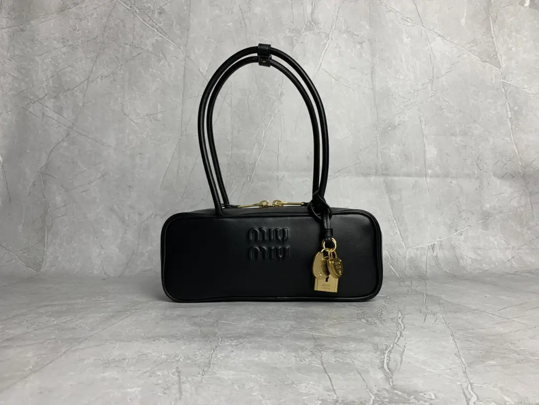 Miu Miu Black Leather Shoulder Bag with Lock Charms image 1