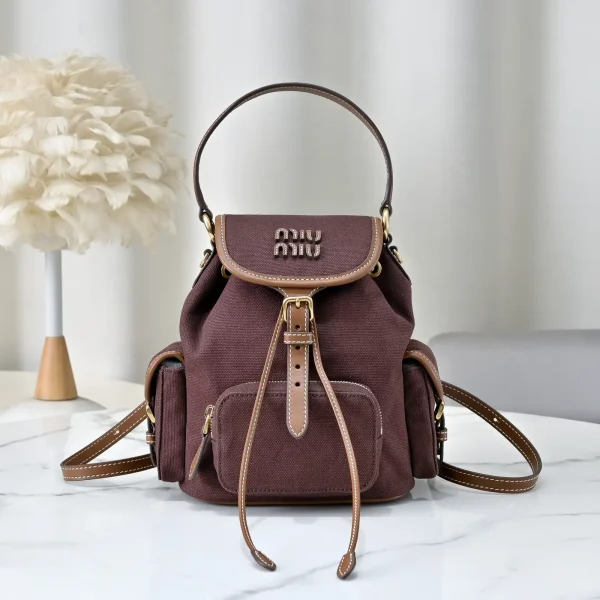Miu Miu Canvas and Leather Multi-Pocket Backpack image 1