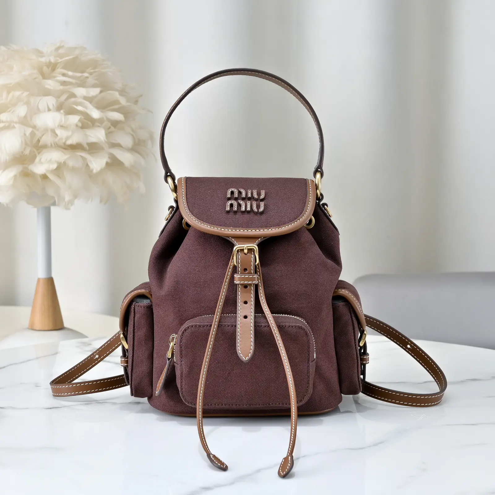 Miu Miu Canvas and Leather Multi-Pocket Backpack image 1