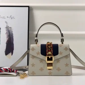 Gucci Bee and Star Print Top Handle Bag image 1