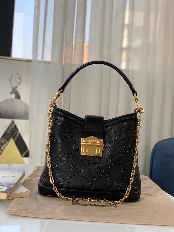 Gucci Black Embossed GG Shoulder Bag image 1