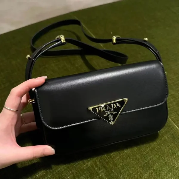 Prada Black Shoulder Bag with Gold-Tone Logo Plaque image 1
